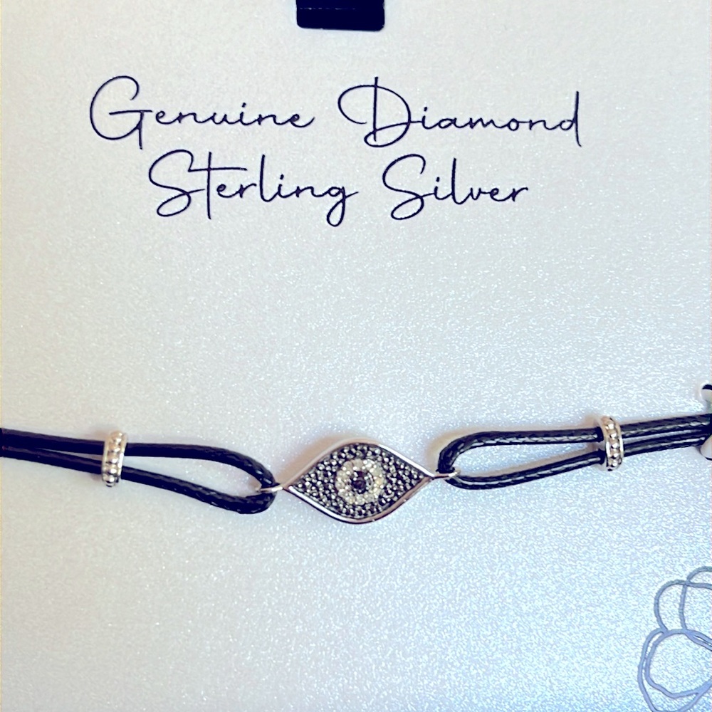 Evil eye diamond and silver bracelet